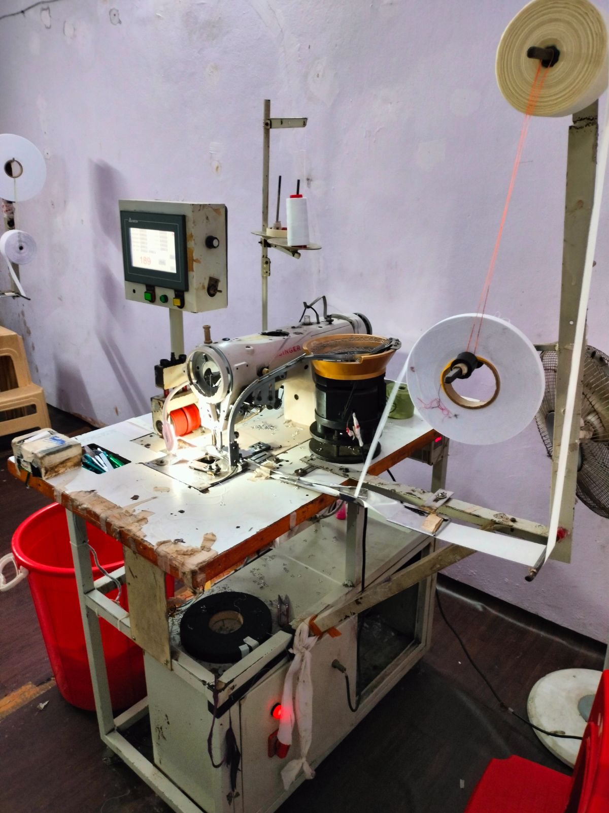 Automatic Hook and Eye tape sewing machine 