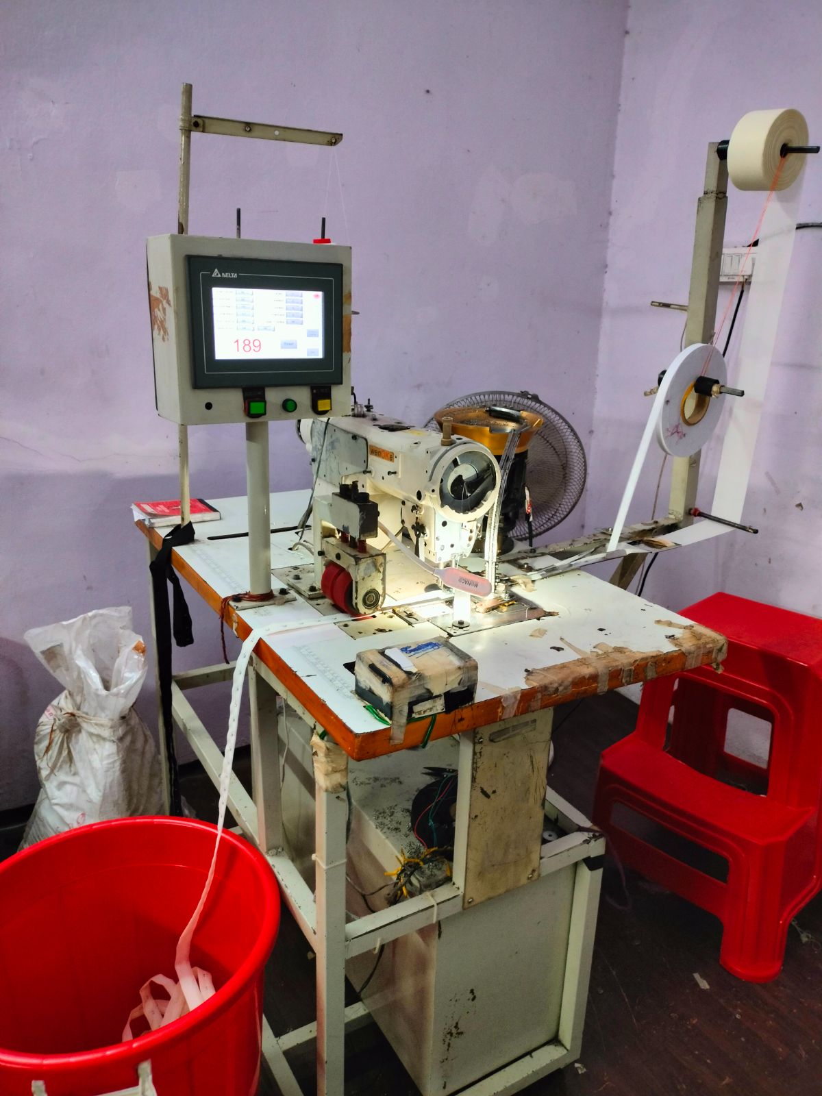 Automatic Hook and Eye tape sewing machine 2