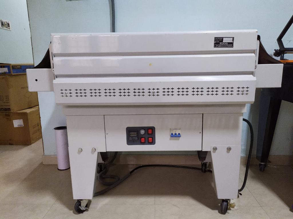 COMPLETE SHRINK WRAPPING LINE – LOW HOUR USAGE 
